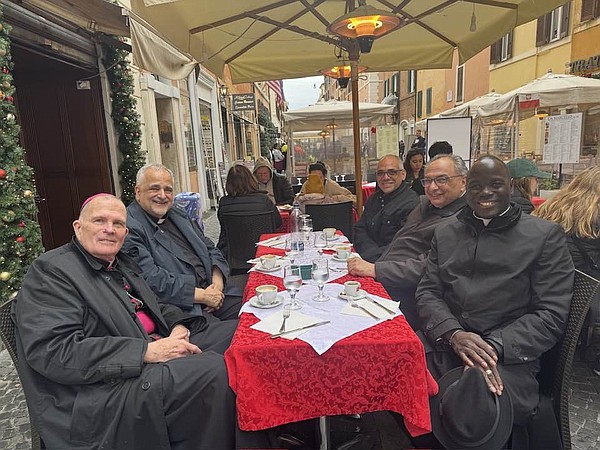 PILGRIMAGE BISH PRIESTS AT_LUNCH FR_JEAN_FB_t600